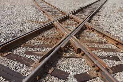 depositphotos_30641401-stock-photo-railroad-tracks-crossing.jpg